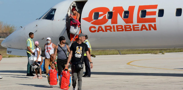Por camagüey regresan cubanos varados en Haití (+Fotos)