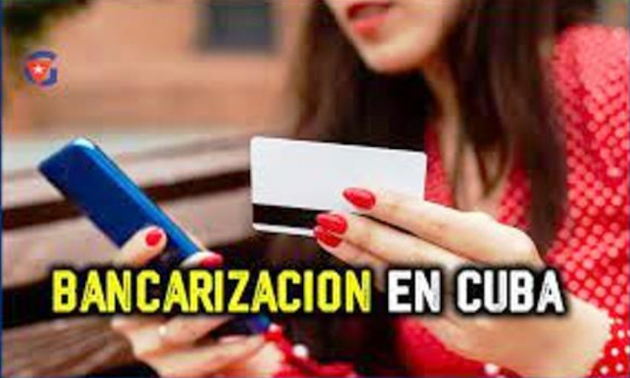 Foto: Tomada de radio26.cu Debaten sobre proceso de bancarización